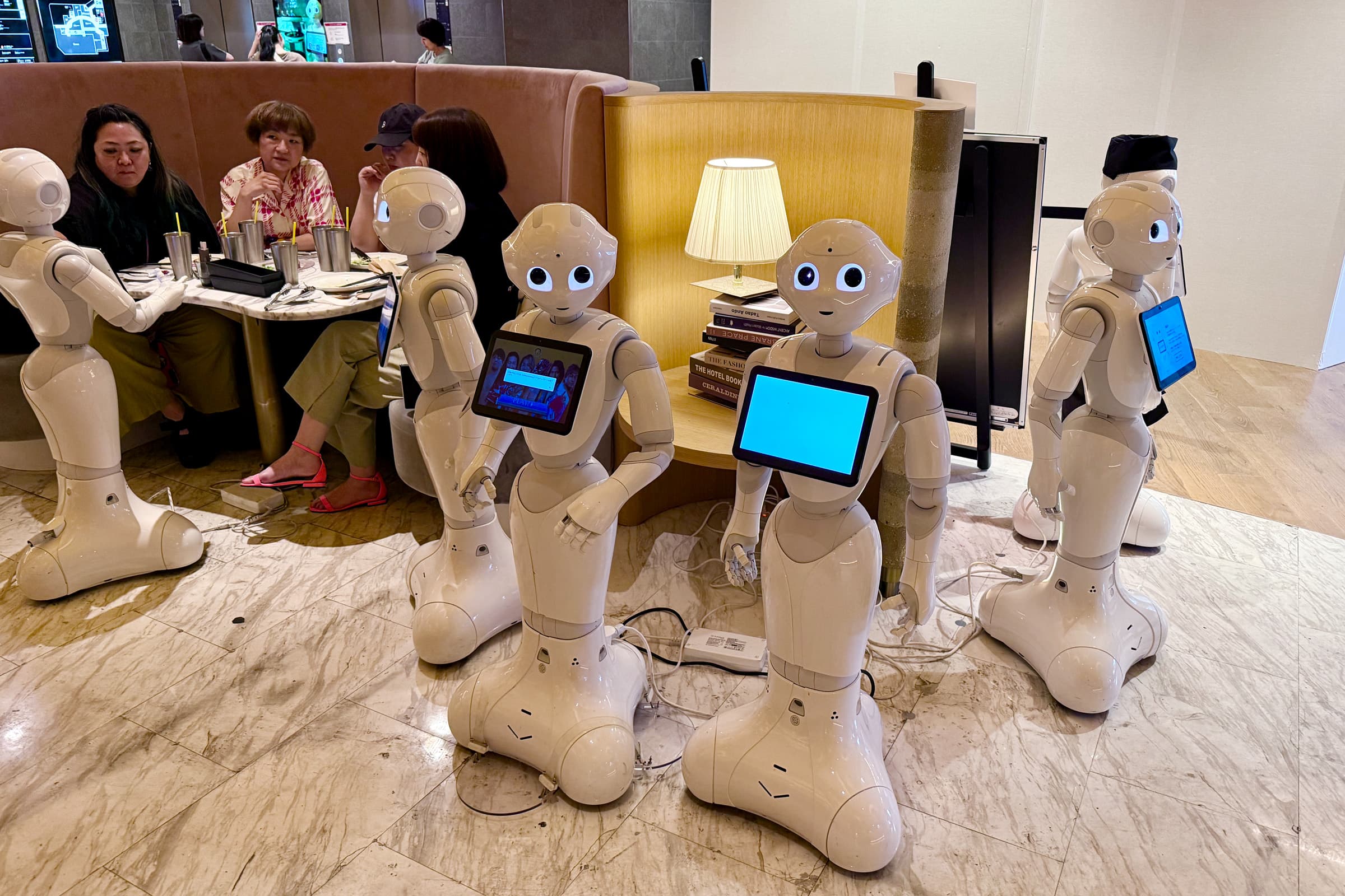 {caption: Pepper Parlor, a coffee shop run entirely by robots (well, almost).}